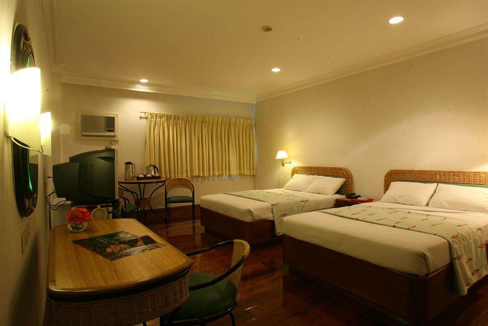 The Legend Palawan Hotel Puerto Princesa Exterior photo