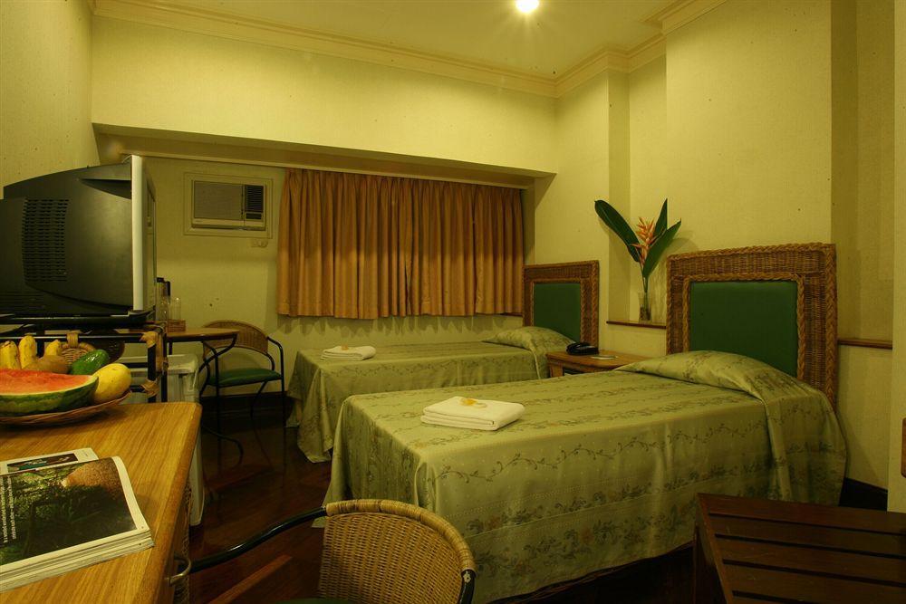 The Legend Palawan Hotel Puerto Princesa Exterior photo