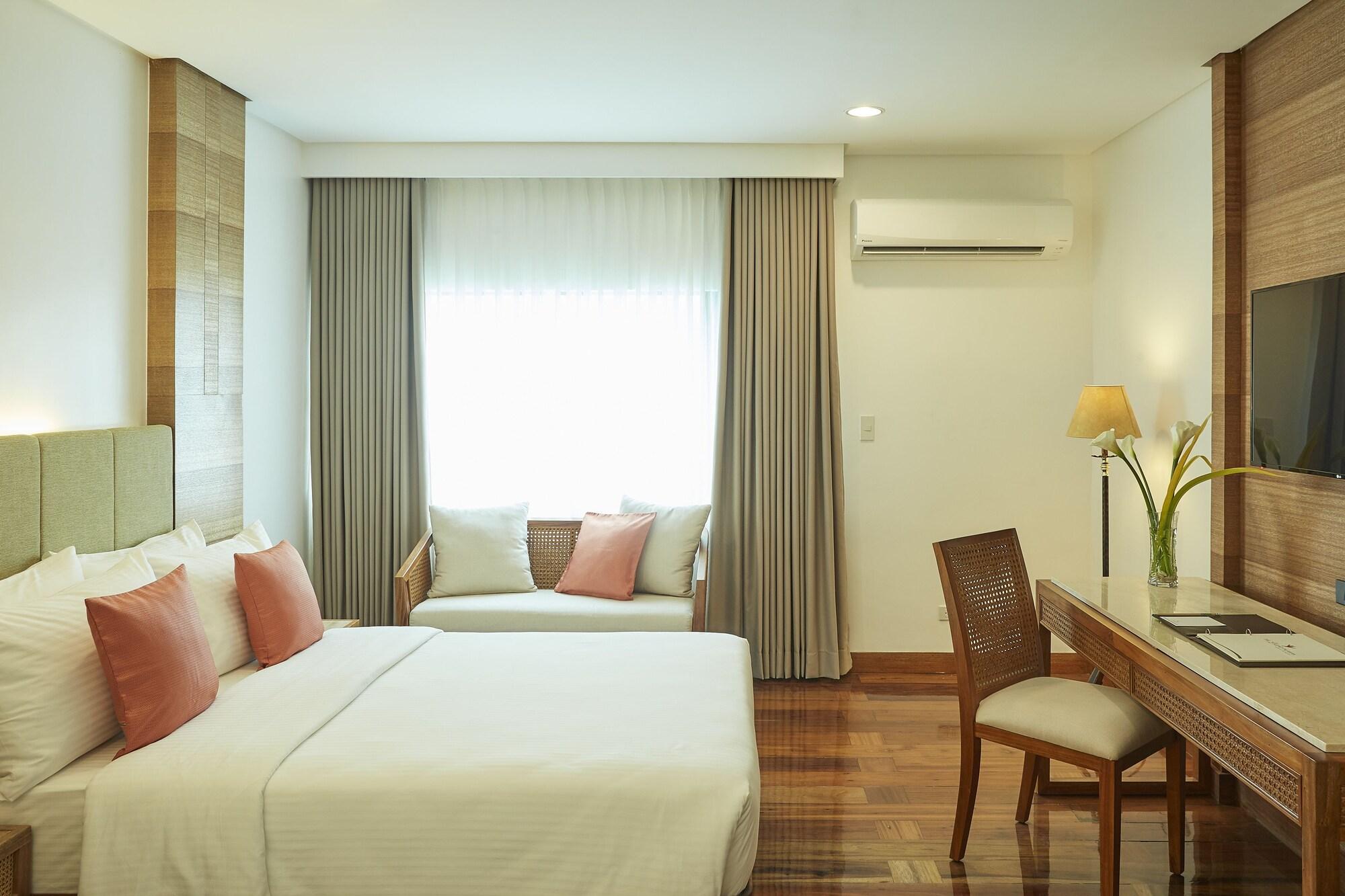 The Legend Palawan Hotel Puerto Princesa Exterior photo